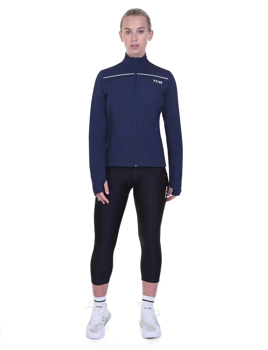 TCA Veste de Course à Pied et de Cyclisme Thermique pour Femmes. Veste Coupe-Vent, Réfléchissante et Respirante avec poches zippées