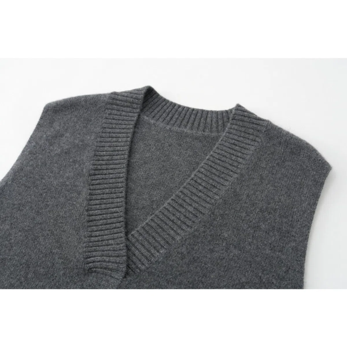 Dawwoti Femme Pulls sans Manches Col V Gilet Sweat Tricot Gilet Top Ourlet irrégulier Couleur Unie