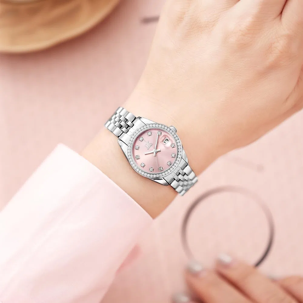 SHENGKE Montre pour Femmes avec Bracelet en Alliage d'acier et Cristaux Montre à Quartz et Calendrier pour Femmes