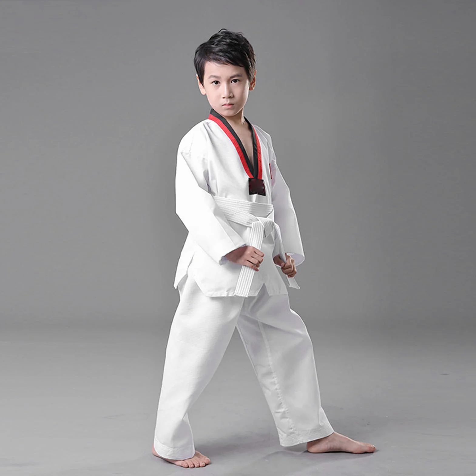 Combinaison de Taekwondo, Taille 136 à 146cm Uniforme d'entraînement de Taekwondo Confortable et Respirant Combinaison Dobok Uniforme d'entraînement d'étudiant léger pour Les enfan