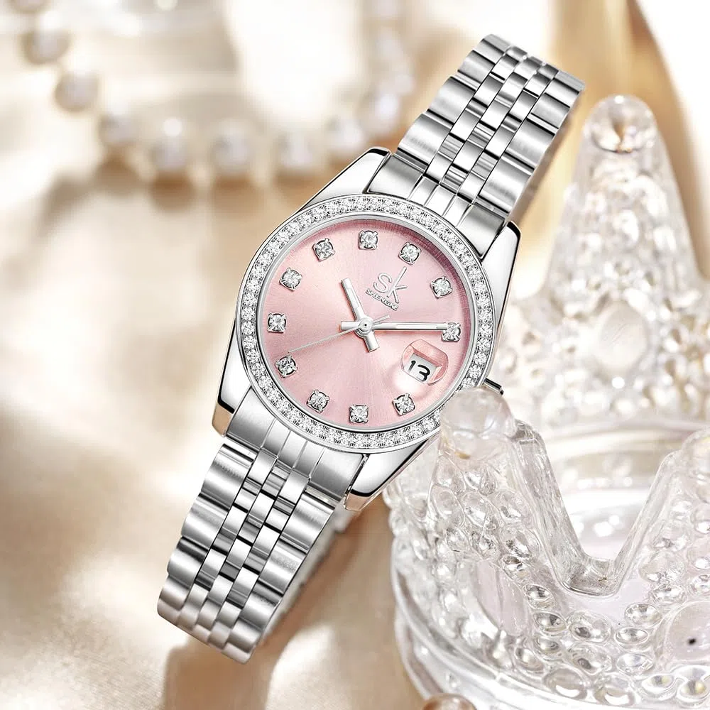 SHENGKE Montre pour Femmes avec Bracelet en Alliage d'acier et Cristaux Montre à Quartz et Calendrier pour Femmes