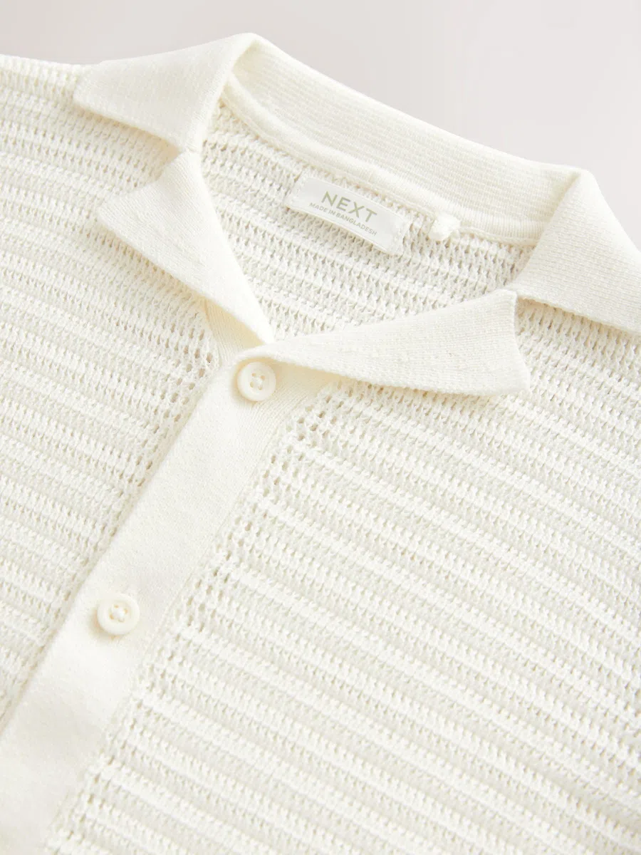 NEXT Garçon Polo en Maille 100% Coton à Manches Courtes texturé et col à Revers